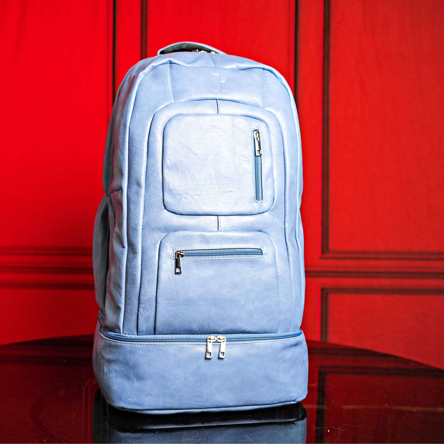Sole Premise Baby Blue Leather Carry-On Patented Backpack