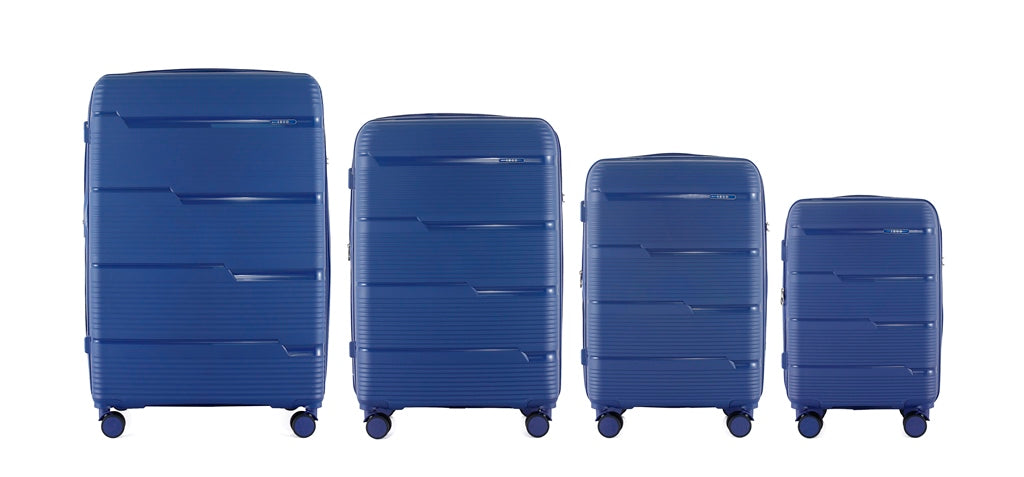 IZOD Dawn Hard shell Expandable Lightweight 4 Piece Luggage Set - Stiles Supply Co.