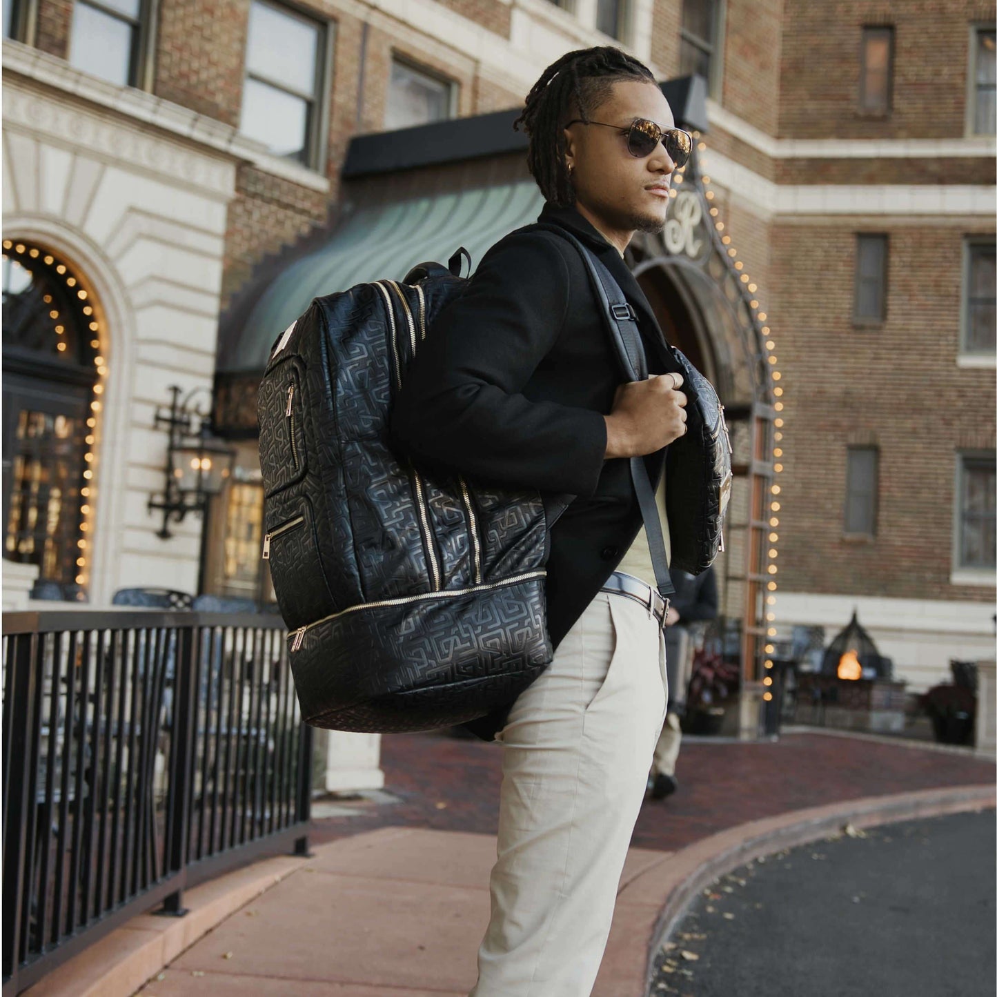 Sole Premise Black Monogram Leather Sneaker Backpack