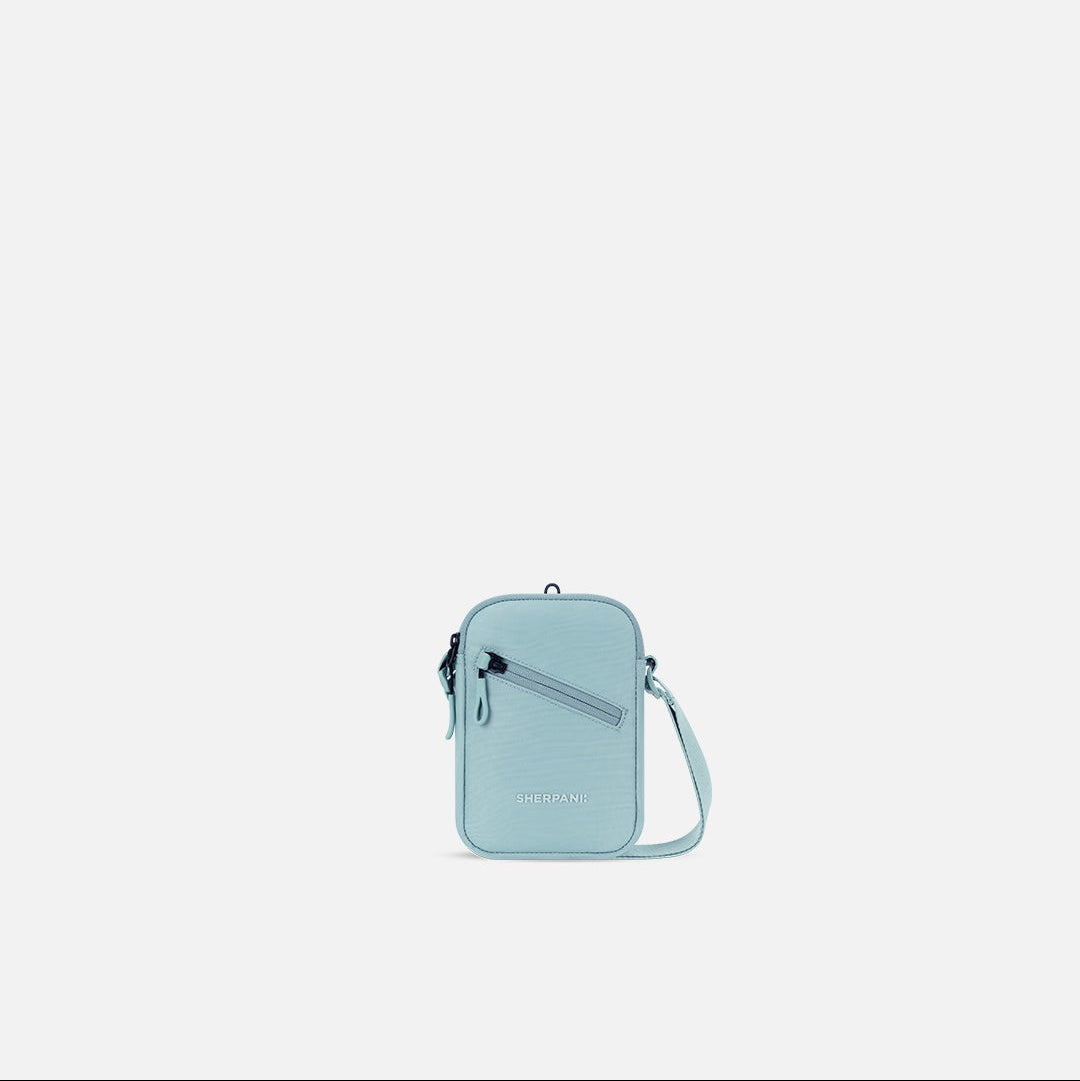 Light blue crossbody bag on a white background