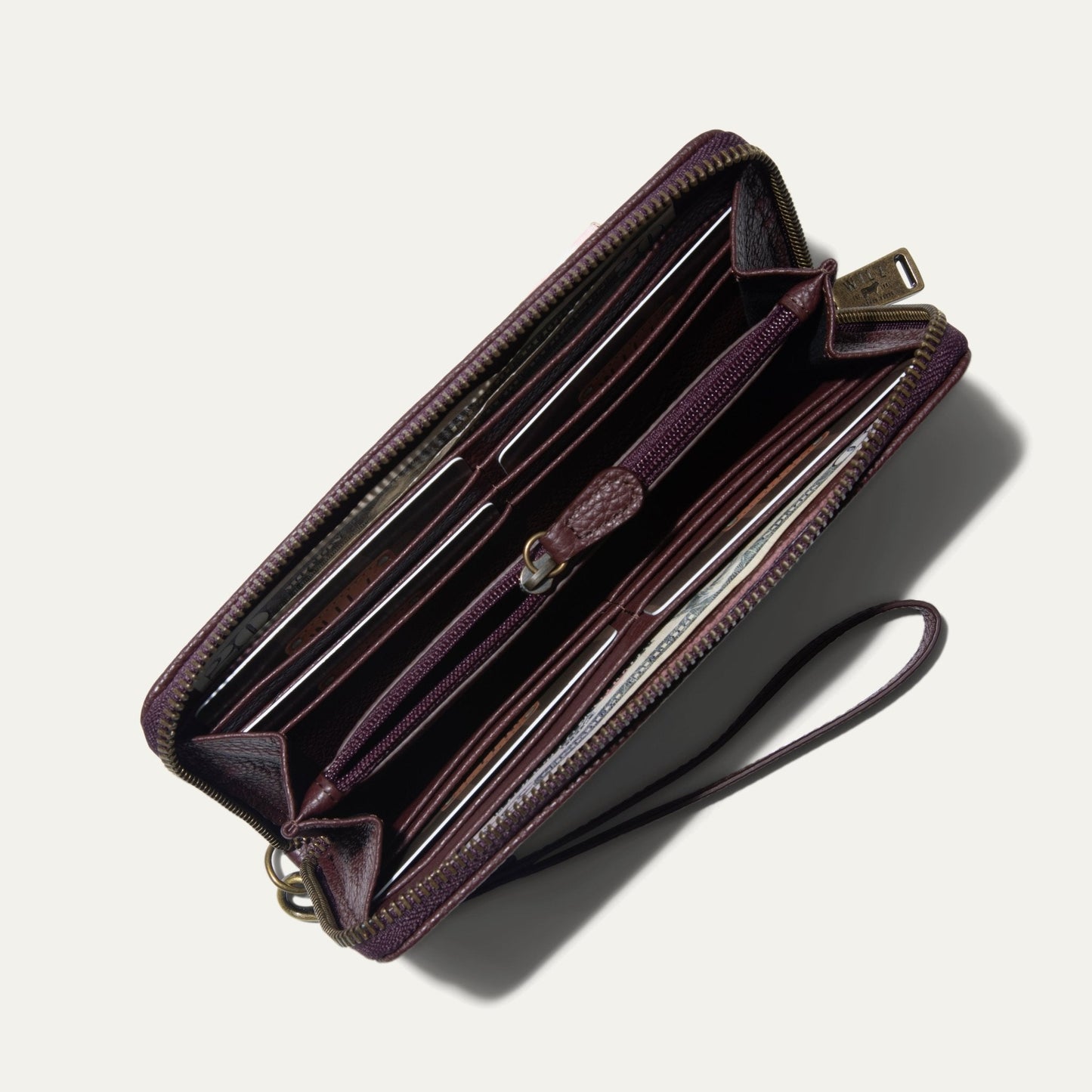 Will Leather Goods Zip Around Clutch