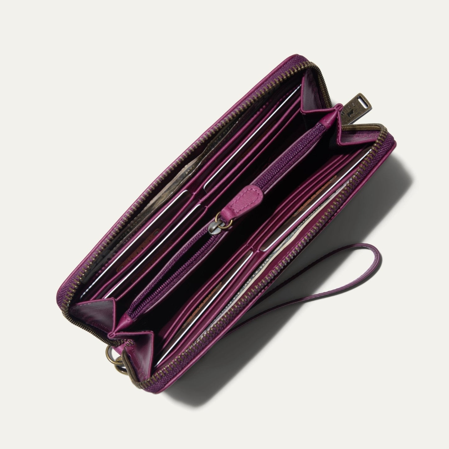 Will Leather Goods Zip Around Clutch