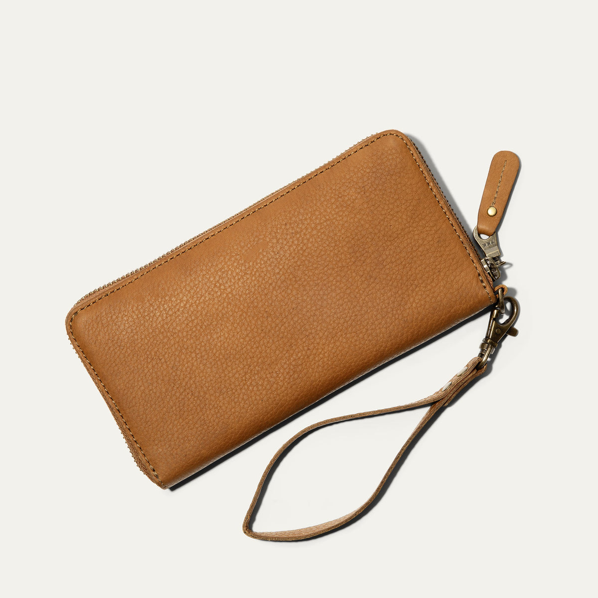 Will Leather Goods Zip Around Clutch