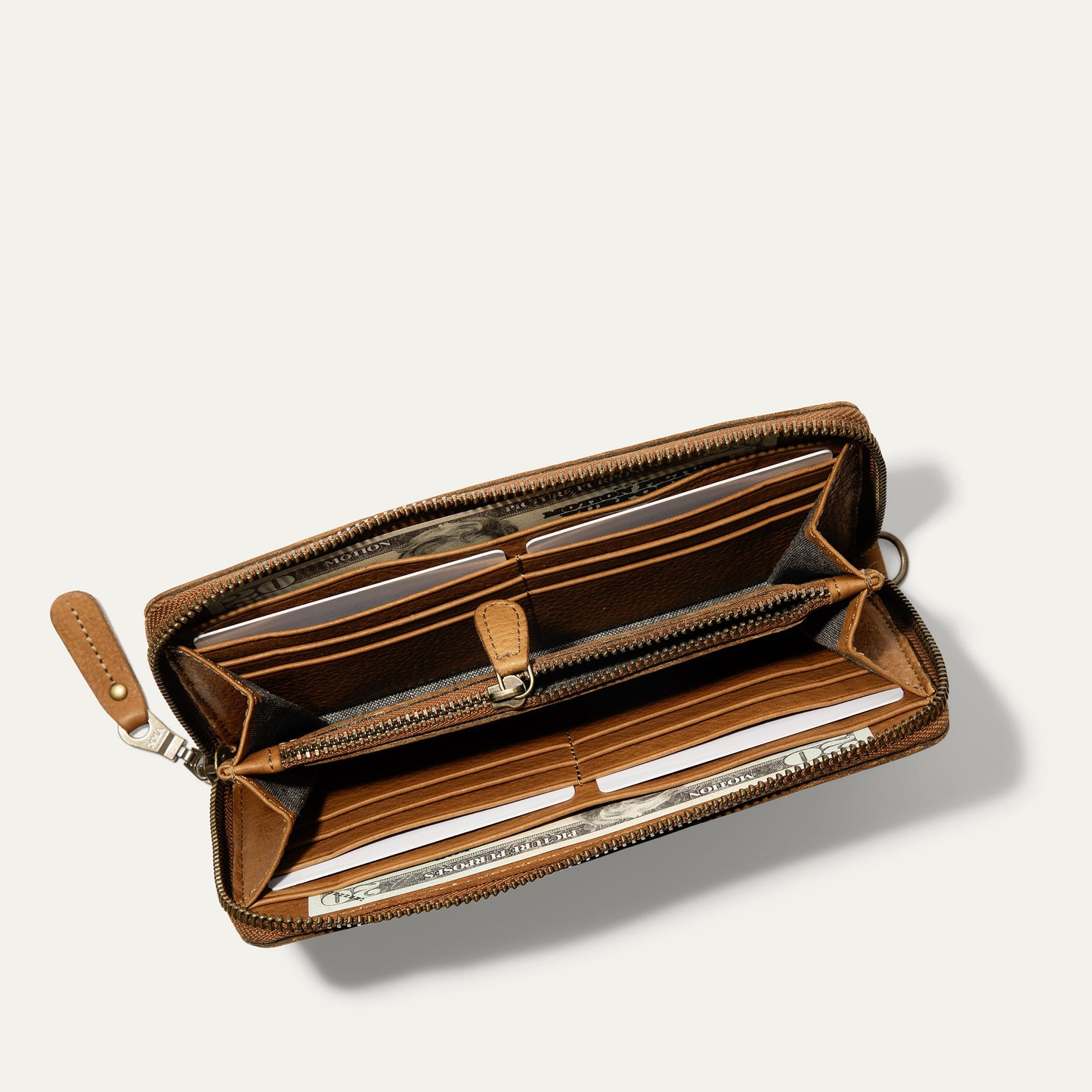 Will Leather Goods Zip Around Clutch
