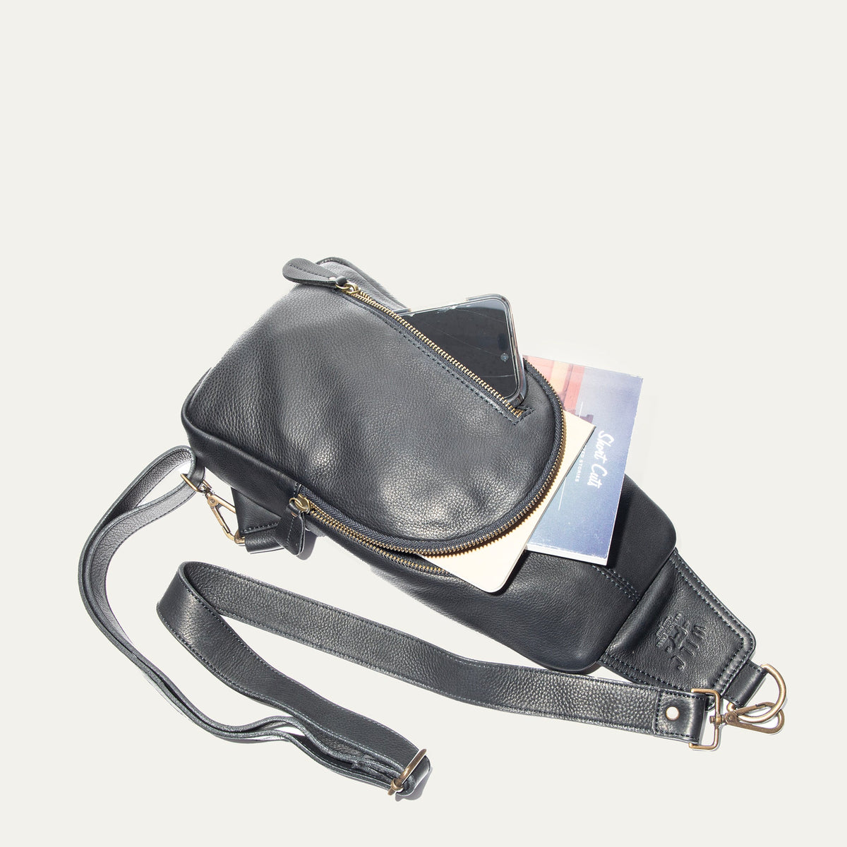 Will Leather Goods Zip Around Sling