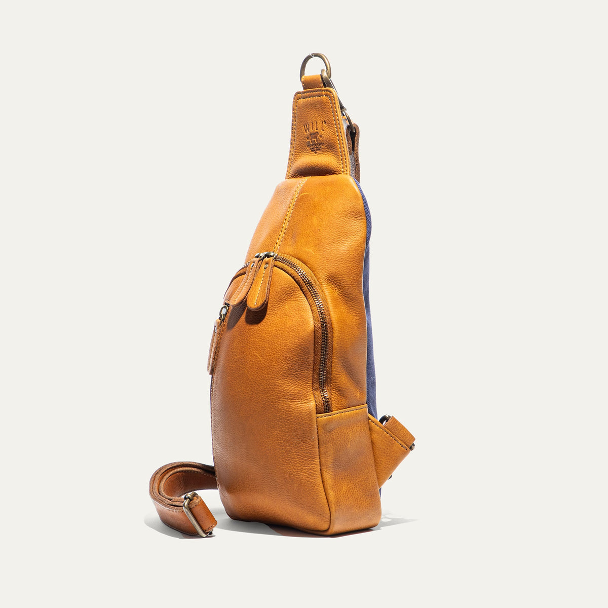 Will Leather Goods Zip Around Sling