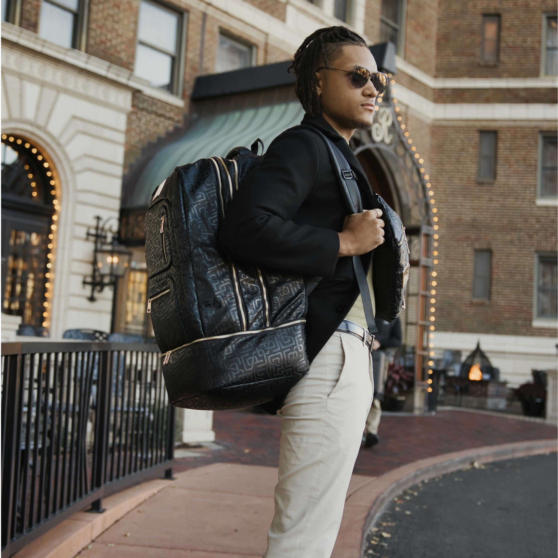 Sole Premise Black Monogram Leather Sneaker Backpack