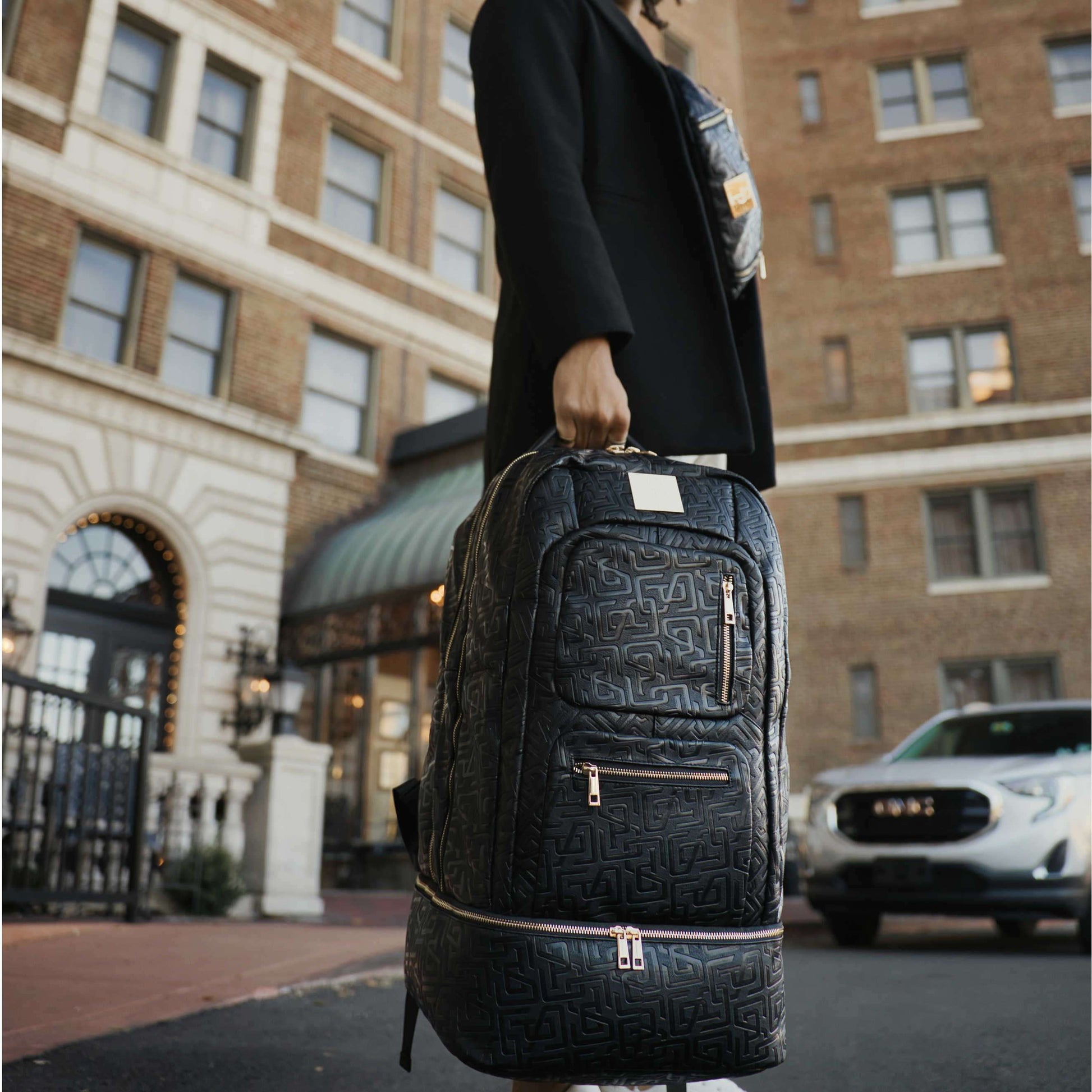 Sole Premise Black Monogram Leather Sneaker Backpack