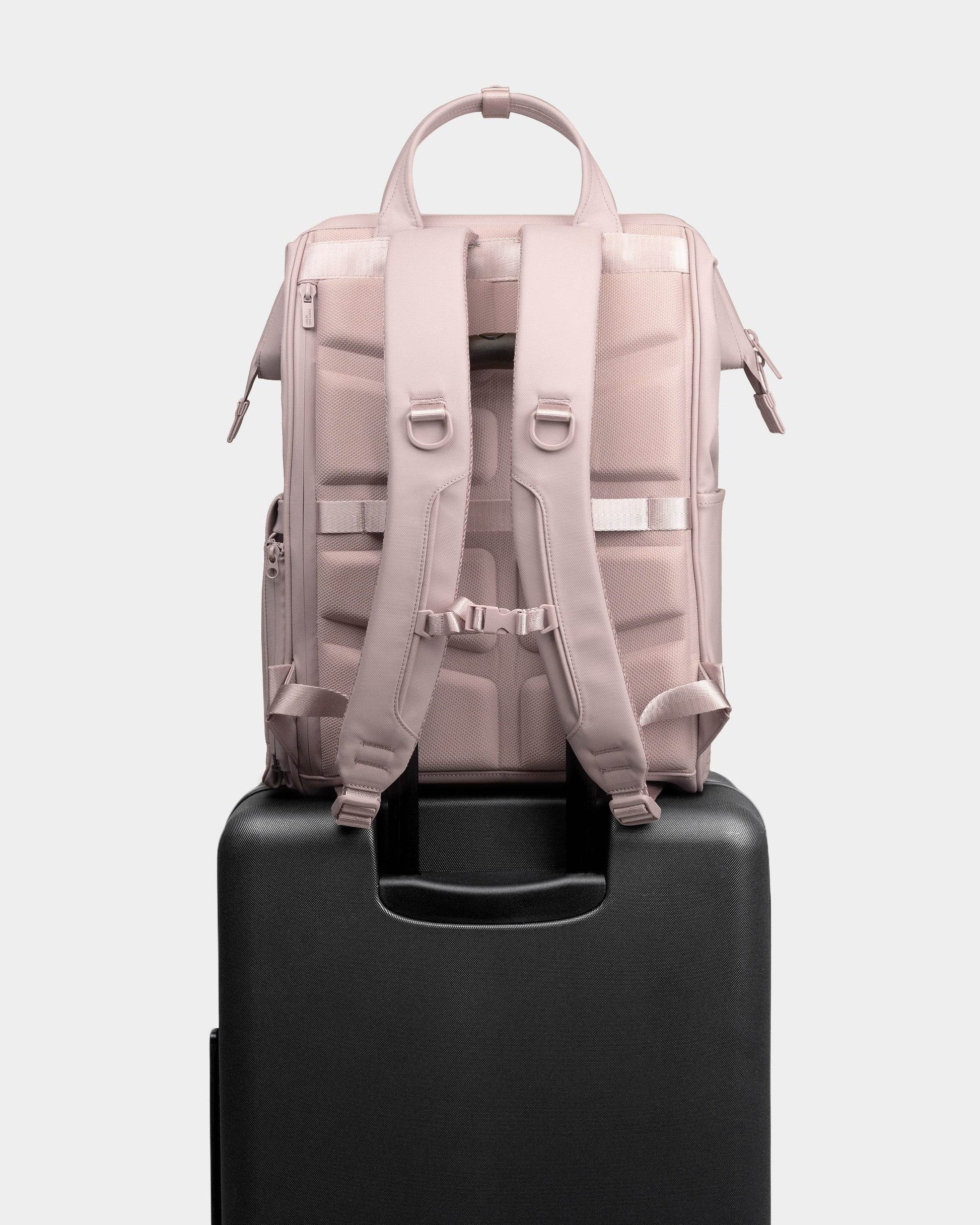 Portland Gear Cascade Getaway Backpack in Blush on luggage