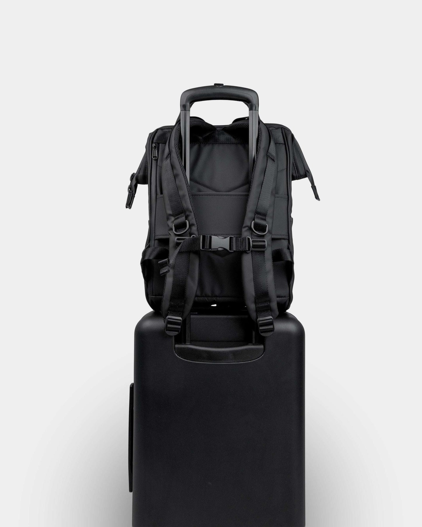 Portland Gear Cascade Weatherproof Backpack 21L on luggage in Black