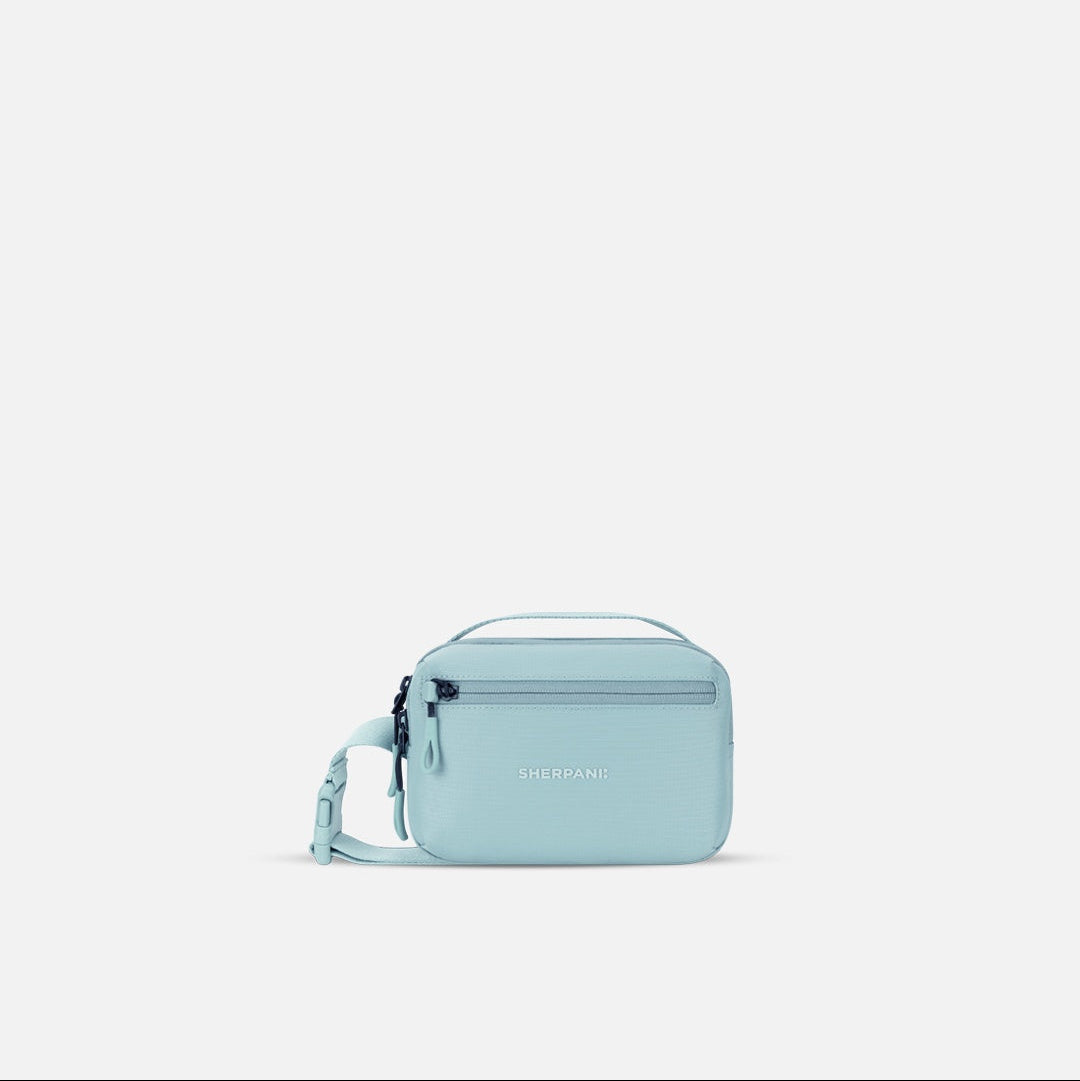 Light blue crossbody bag on a white background