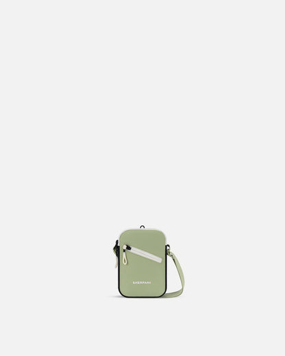 Green crossbody bag with a visible brand logo on a white background