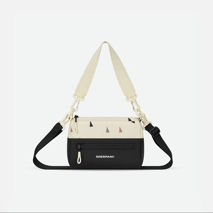 Multicolored bag with a strap on a white background